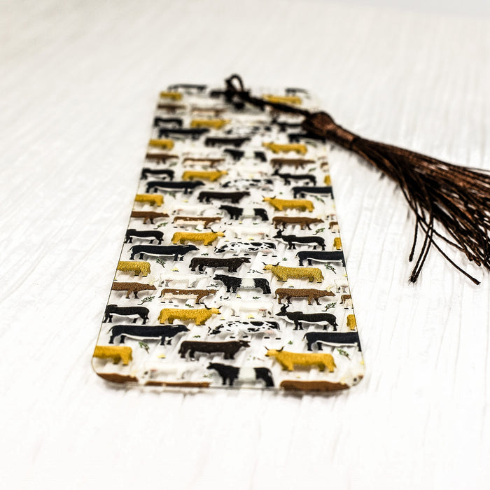 a bookmark with a pattern of dogs on it