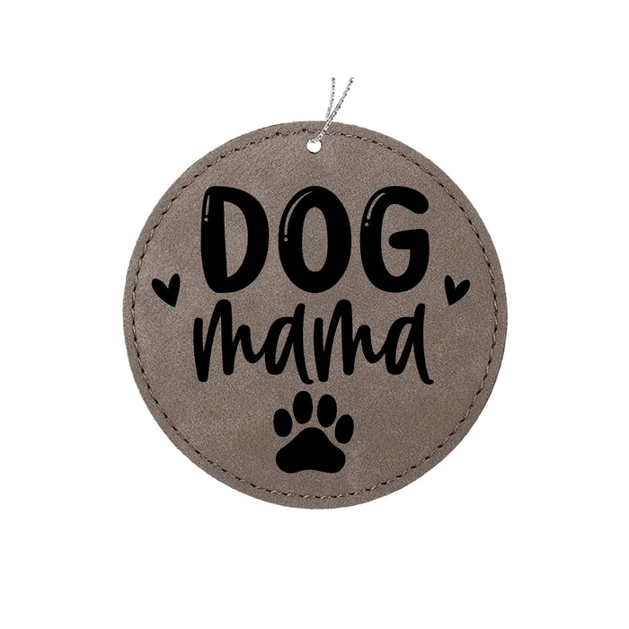 a round ornament with a dog's paw and the words dog mama