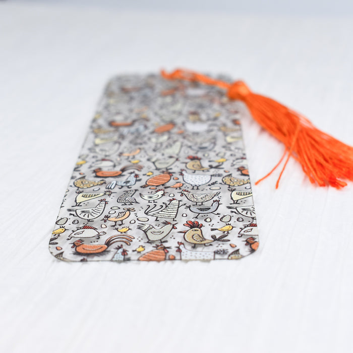 a bookmark with a tassel on top of it