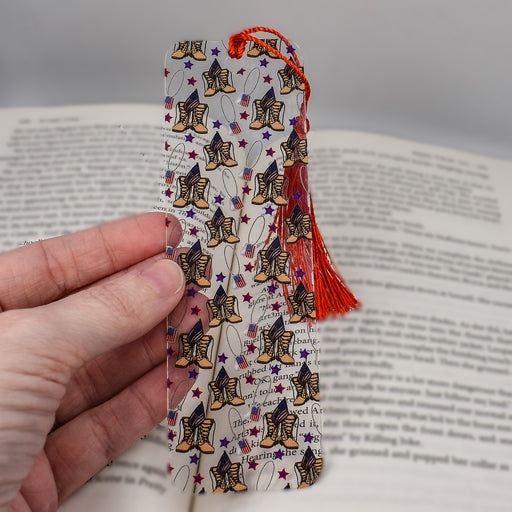 a person holding a bookmark in their hand