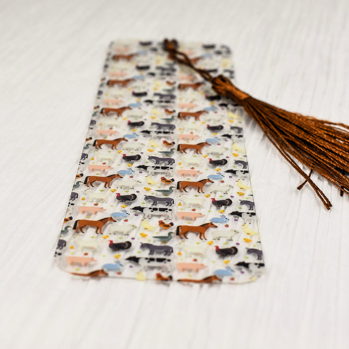 a bookmark with a tassel on top of it