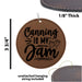 a leather ornament with the words canning is my jam printed on it