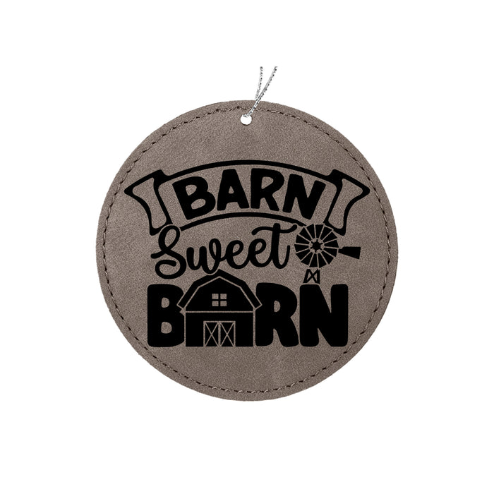 a round ornament with the words barn sweet born on it