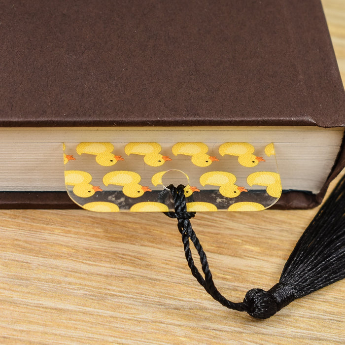 a book with a tassel on top of it