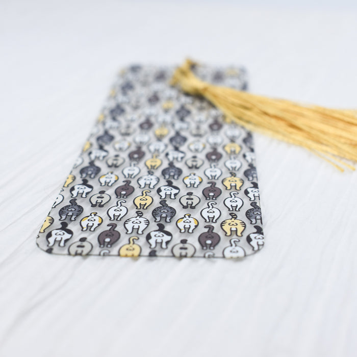 a tie with a tassel on top of it