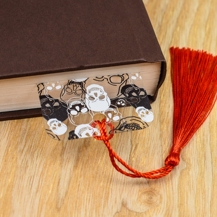 a book with a tassel on top of it
