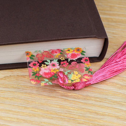 a book and a tassel on a table