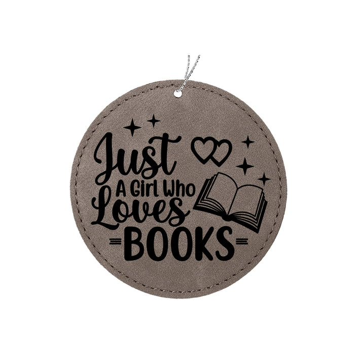 a round ornament with a book on it