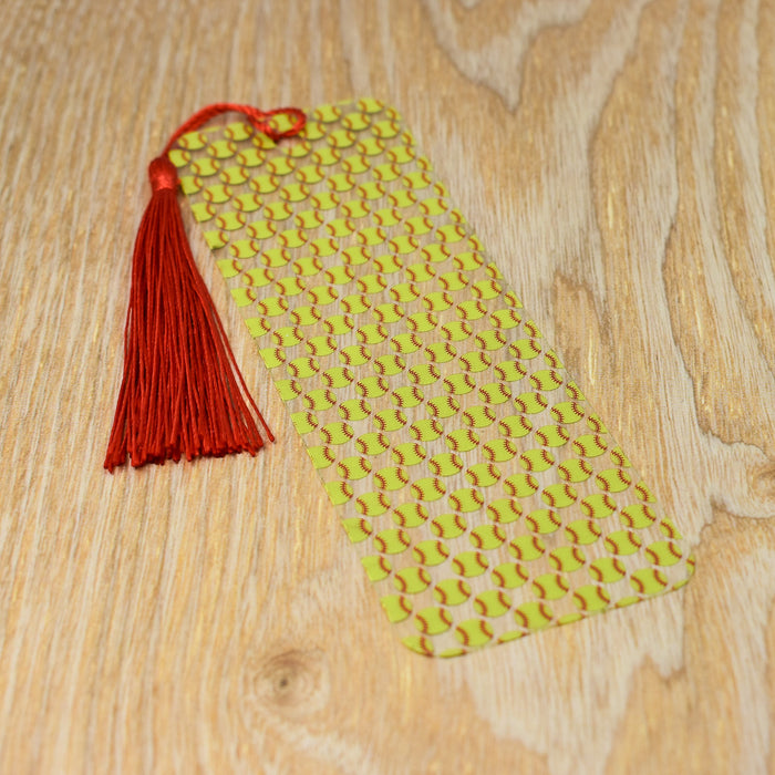 a yellow and red tie sitting on top of a wooden table