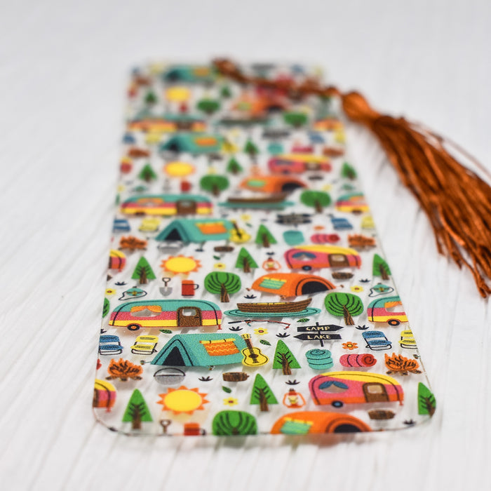 a tie with a pattern of campers and trees on it