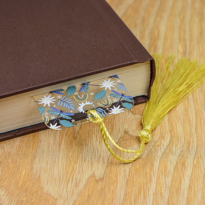 a book with a tassel on top of it