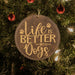 a wooden ornament hanging from a christmas tree