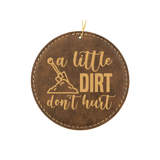 a brown leather ornament with the words a little dirt don't hurt