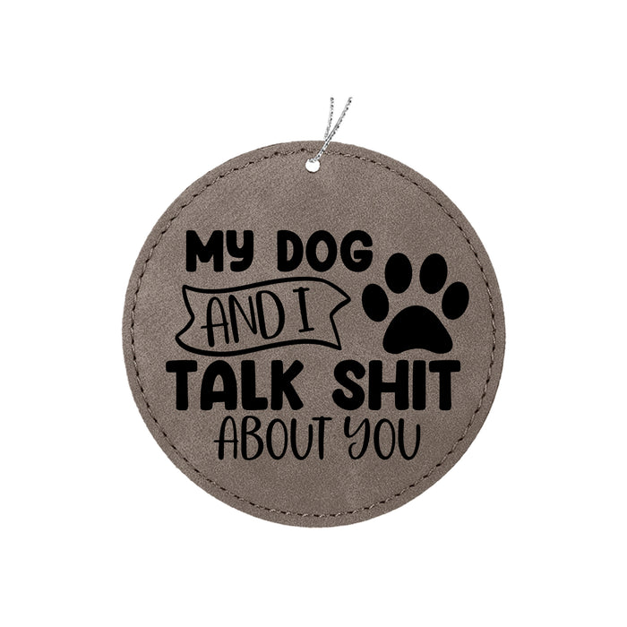 a round ornament with a dog and i talk shit about you on it