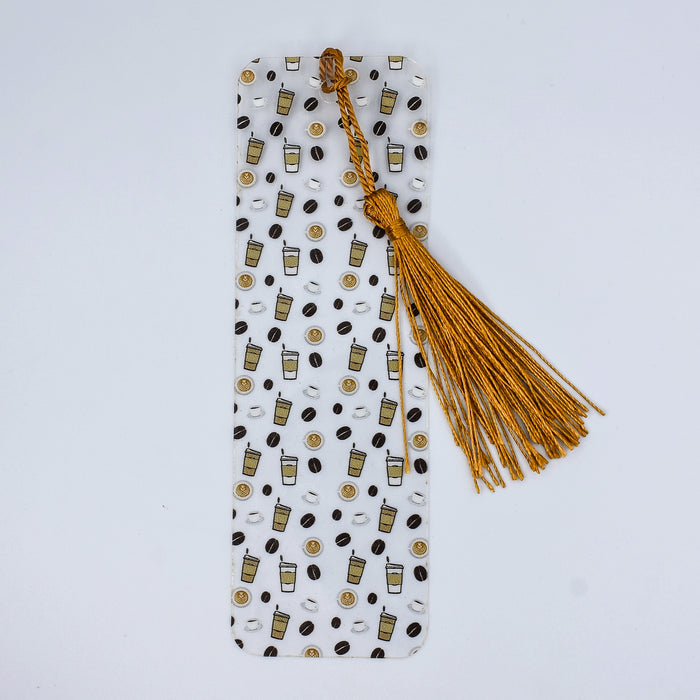 a bookmark with a tassel hanging from it