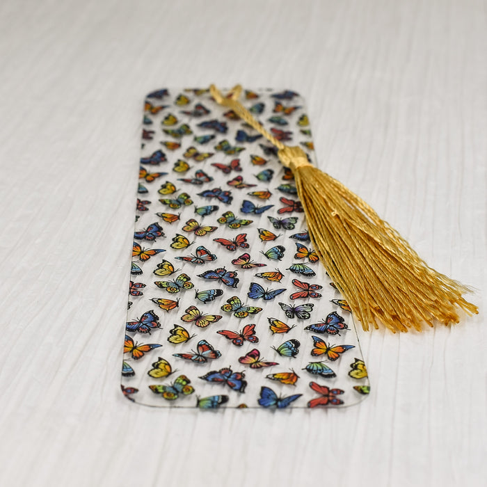 a bookmark with a tassel on top of it