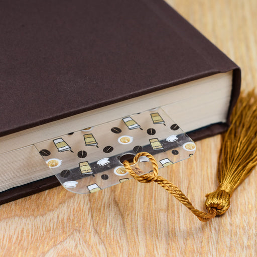 a book with a tassel on top of it