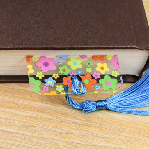 a book with a tassel on top of it