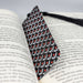 a book with a tie on top of it