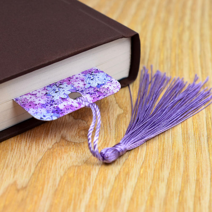 a book with a purple tassel and a bookmark