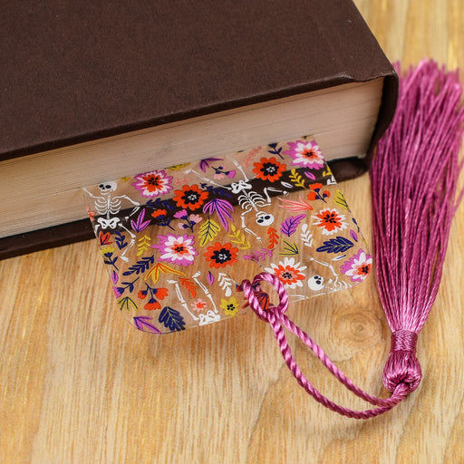 a book with a tassel on top of it