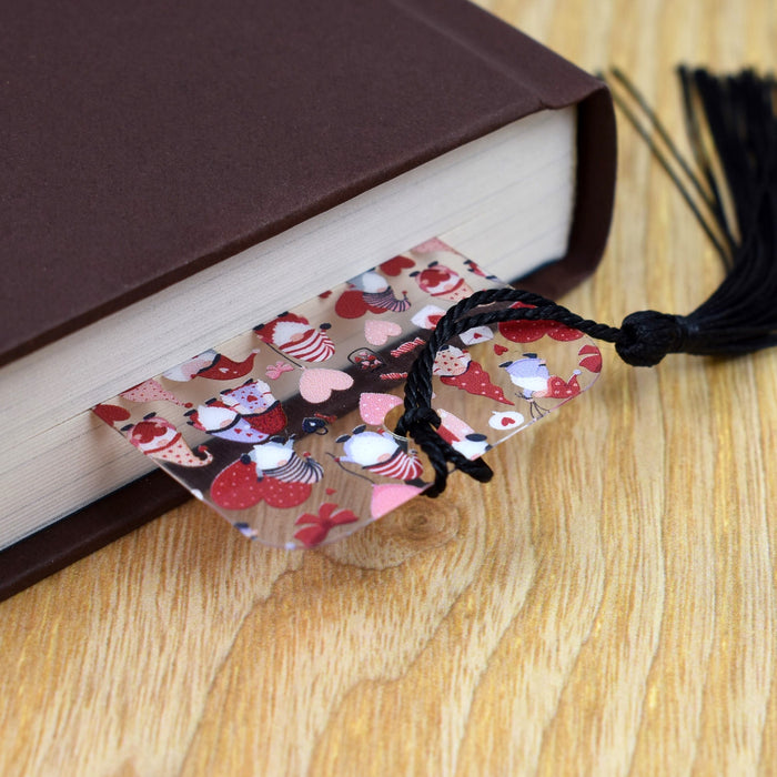 a book with a tassel on top of it