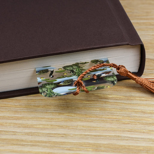 a book with a tassel on top of it