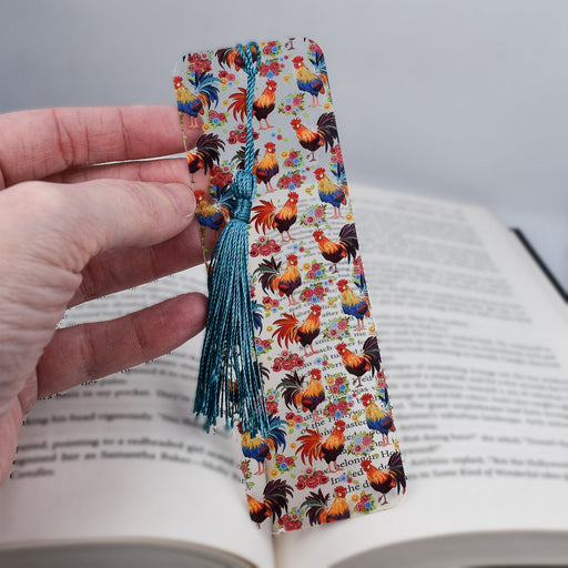 a person holding a book with a tie on it