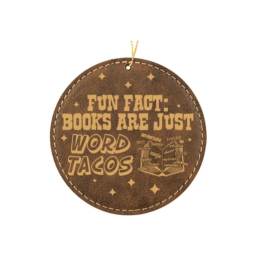 a leather ornament that says fun fact books are just word tacos