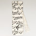 a bookmark with musical notes and a tassel