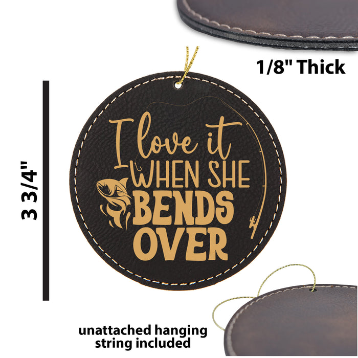 a picture of a leather ornament that says love it when she bends over