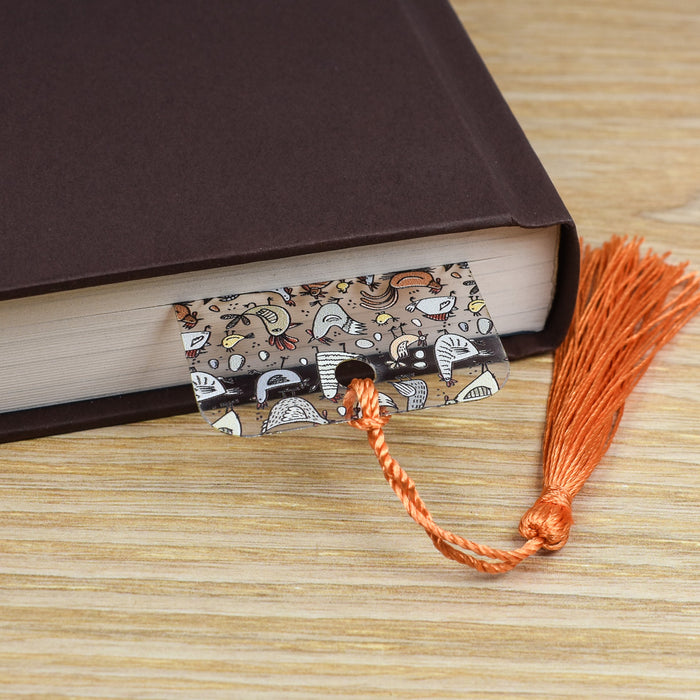 a book with a tassel on top of it