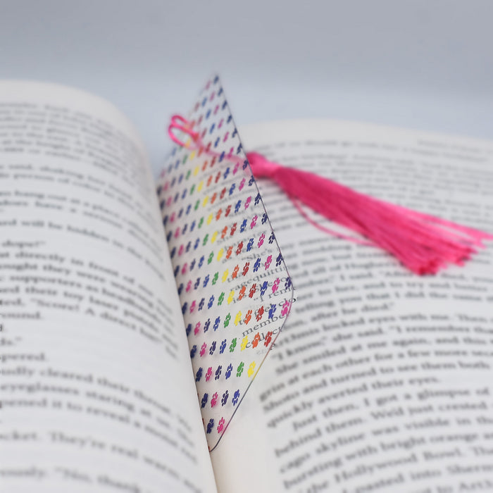 a book with a tassel on top of it