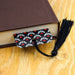 a book with a tassel on top of it