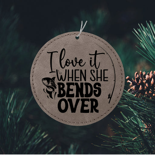 a christmas ornament that says i love it when she bends over