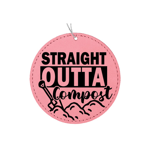 a pink round ornament with the words straight outa compost on it