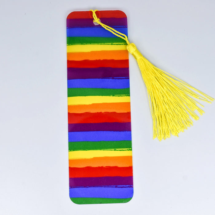 a colorful bookmark with a tassel on top of it