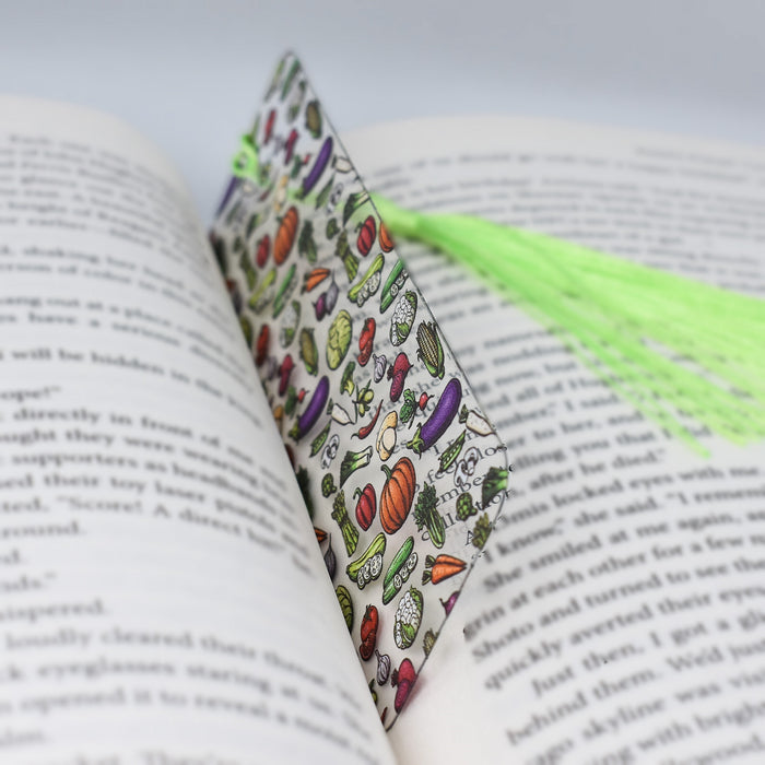 a close up of a book with a tie on it