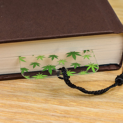 a book with a string attached to it sitting on a table