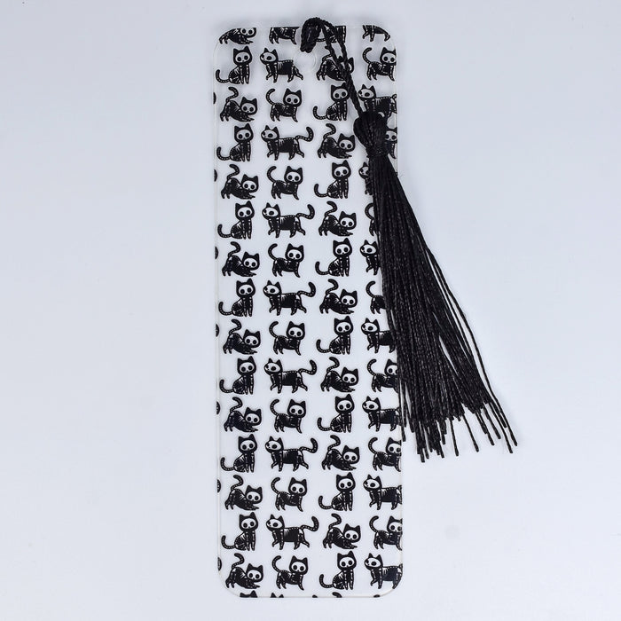 a black and white tie with black cats on it