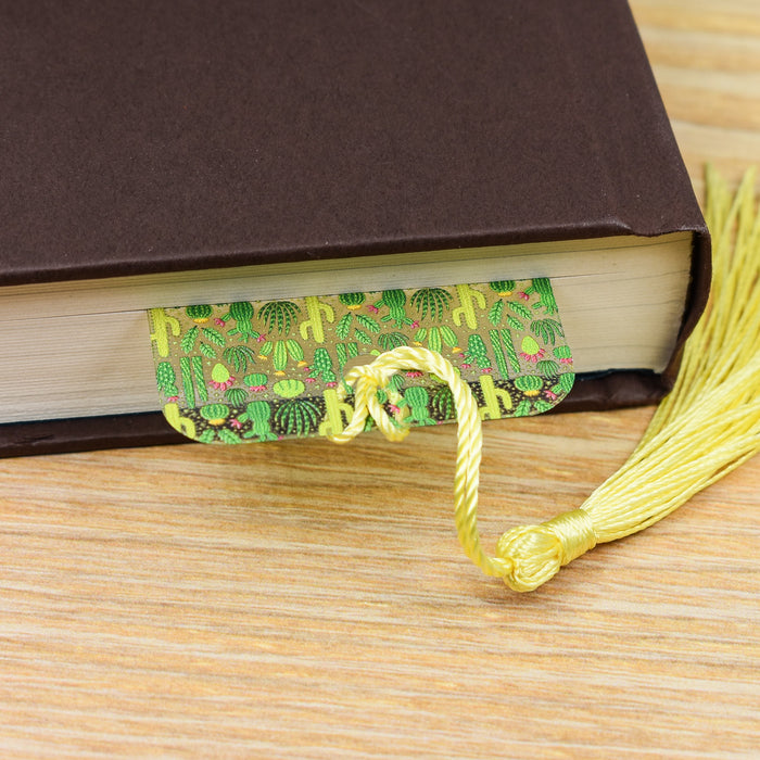 a book with a tassel on top of it