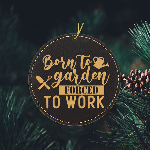 a wooden ornament that says born to garden forced to work