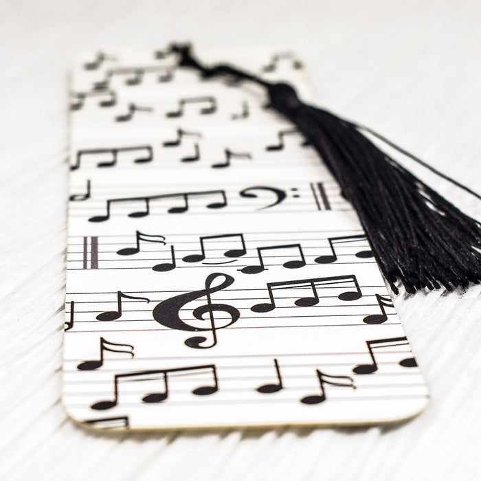 a bookmark with musical notes and a tassel