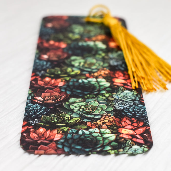 a phone case with a tassel on top of it