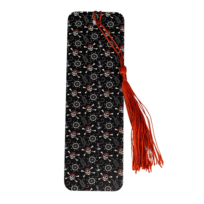 a black and white book with a red tassel