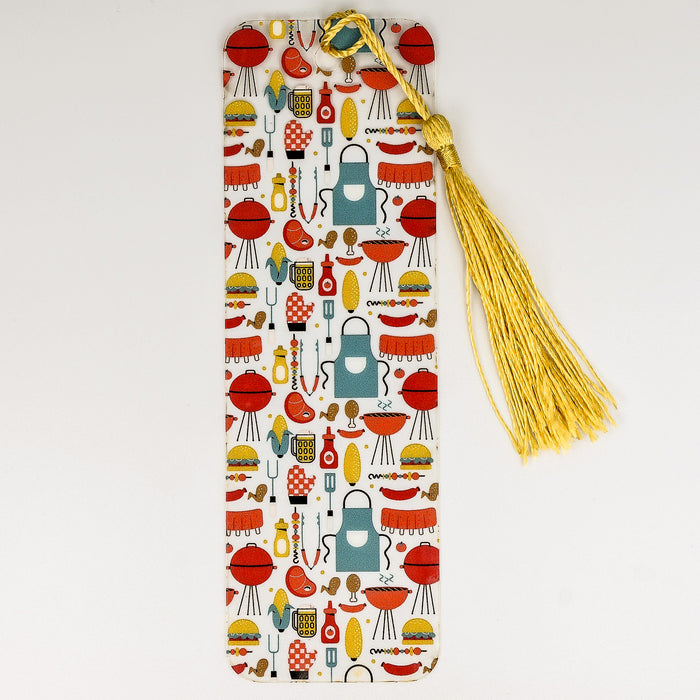 a bookmark with a tassel on top of it