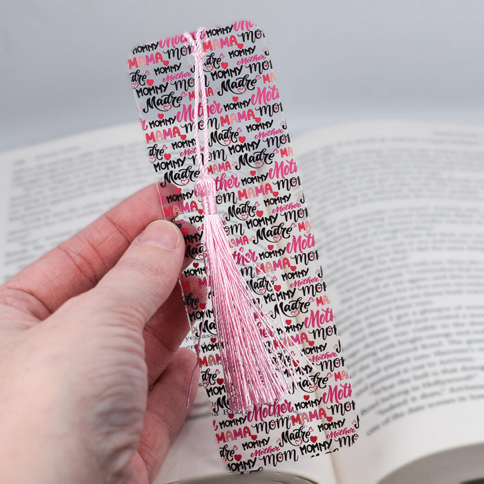 a person holding a bookmark in their hand