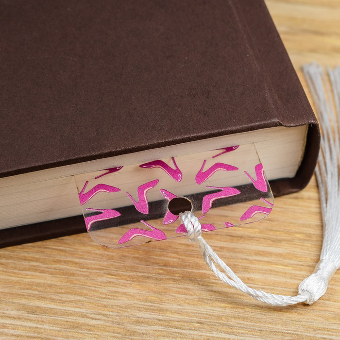 a book with a string attached to it sitting on a table