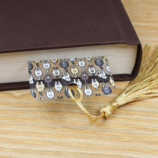 a book with a tassel on top of it