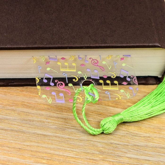 a book with musical notes and a tassel